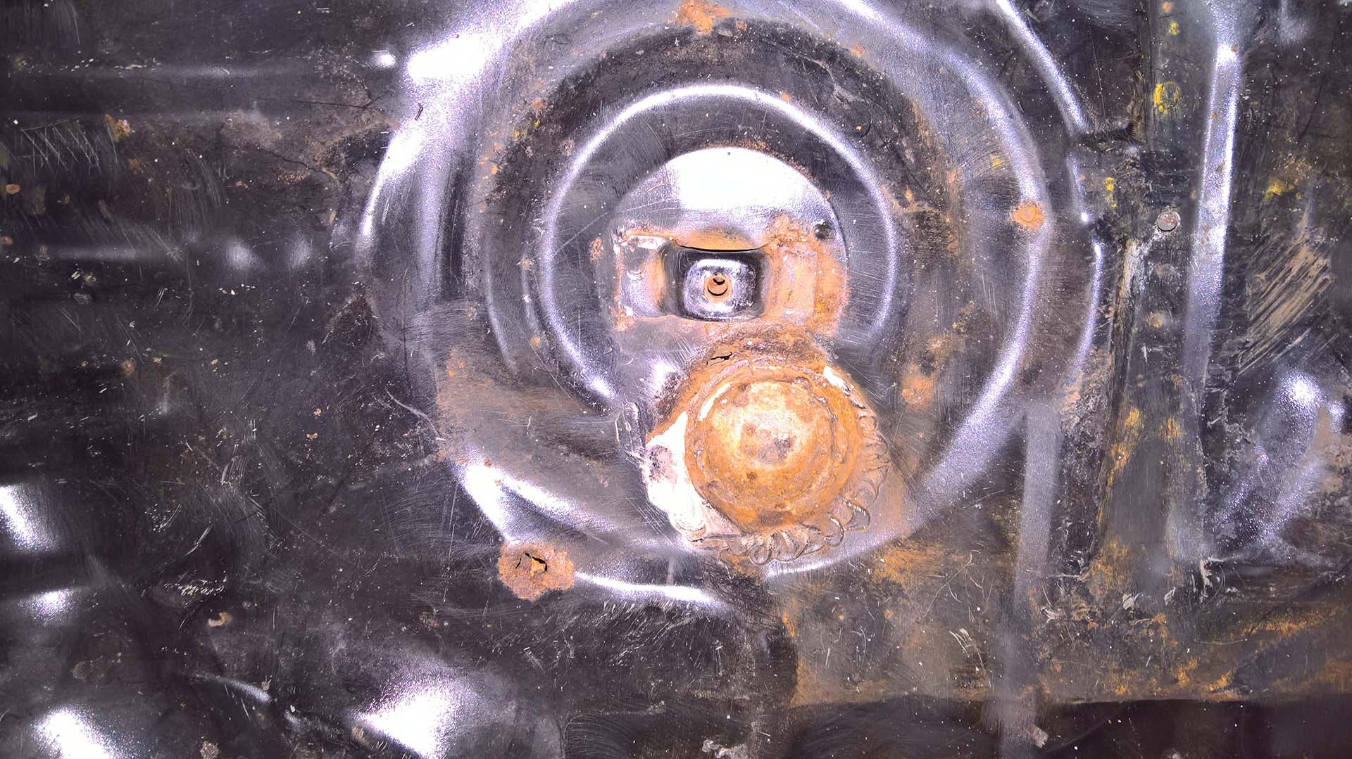 Wire Brushing Revealed Rust in Rear Floor Pan
